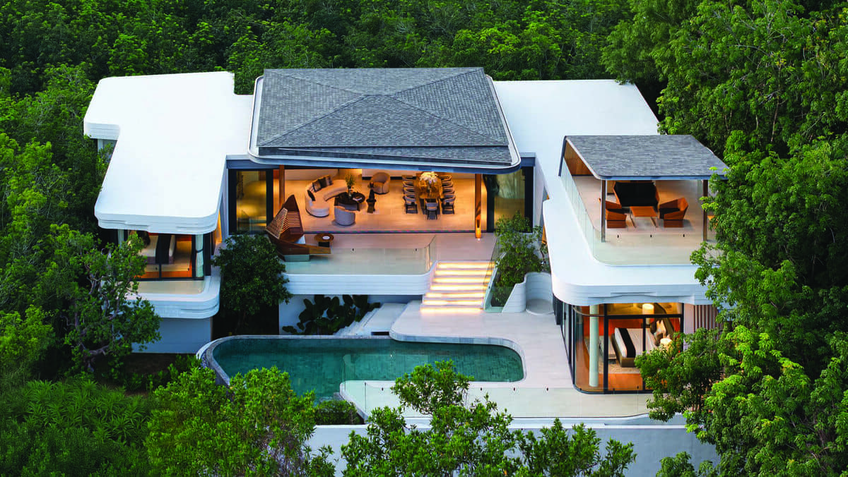 Luxury modern villa in Phuket with pool surrounded by tropical greenery